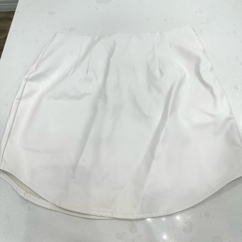 Faux leather white mini skirt